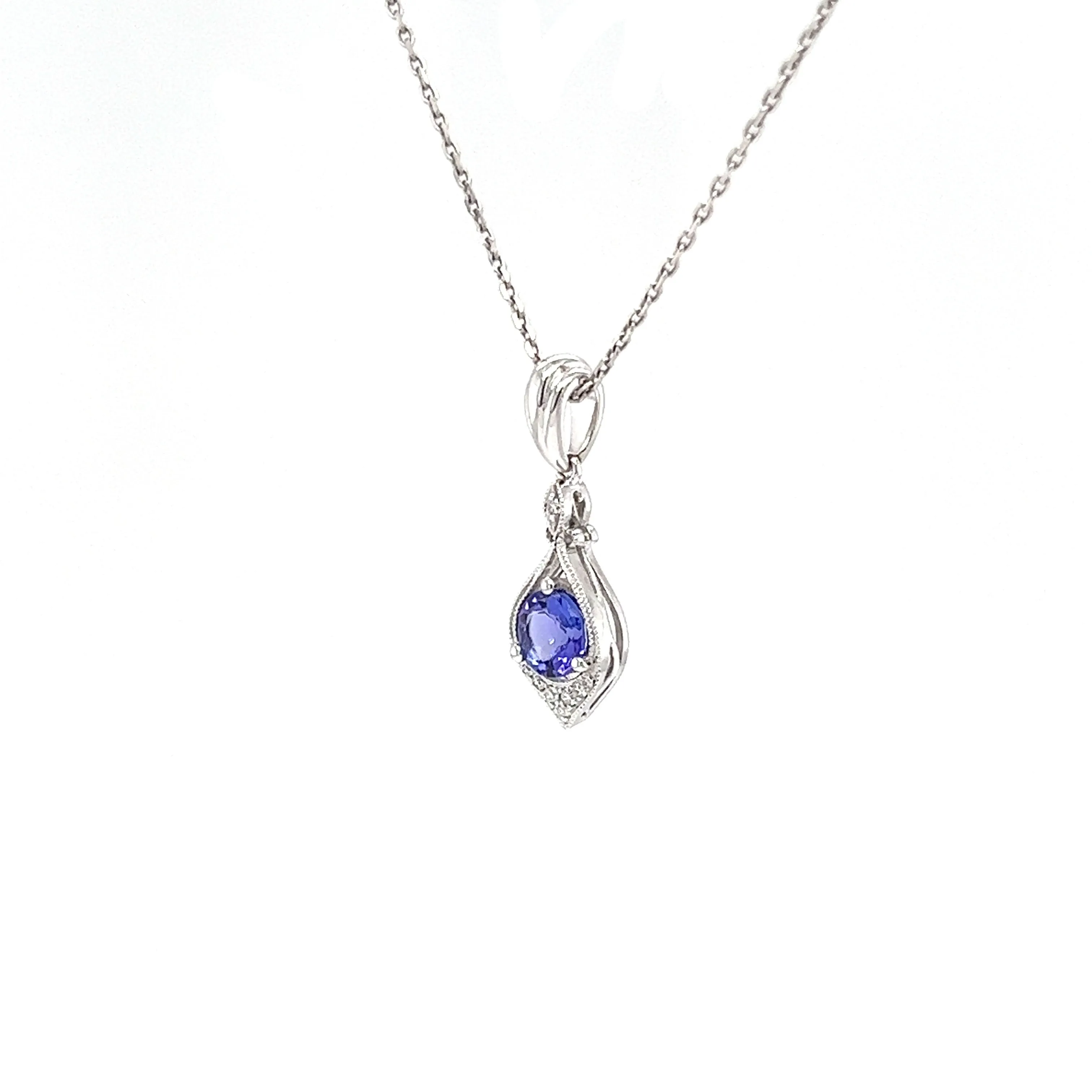 Tanzanite Pendant with Eight Diamonds in 14K White Gold